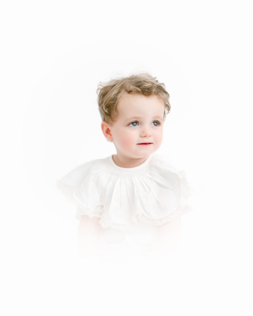 Young boy poses for heirloom session with Morgan Leigh Photography.