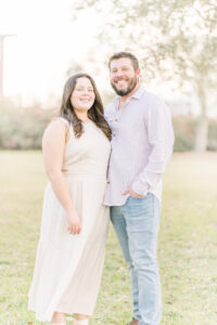 Father and daughter stand together happily during a photoshoot near Baton Rouge, LA.